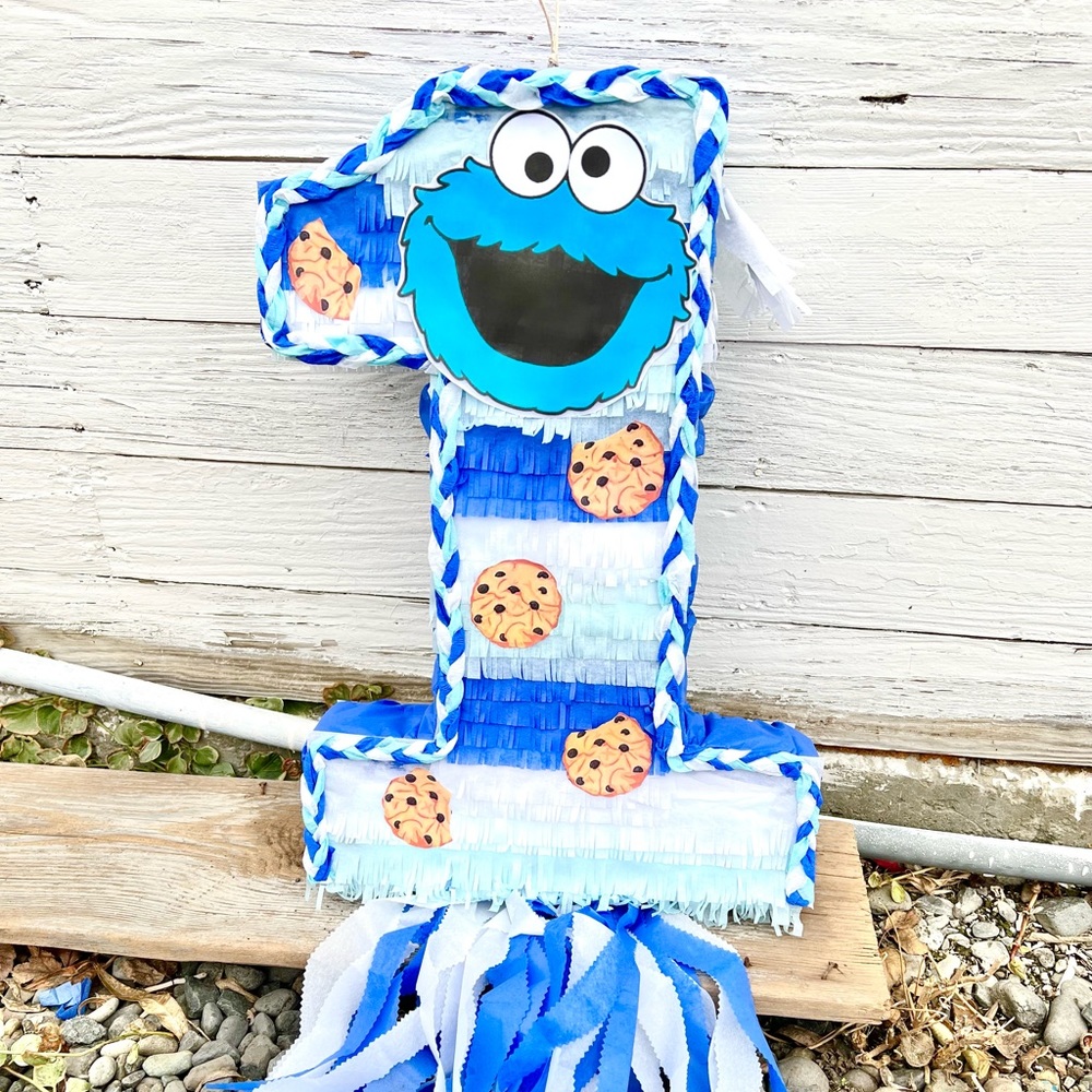 Cookie Monster piñata number one Sesame Street party